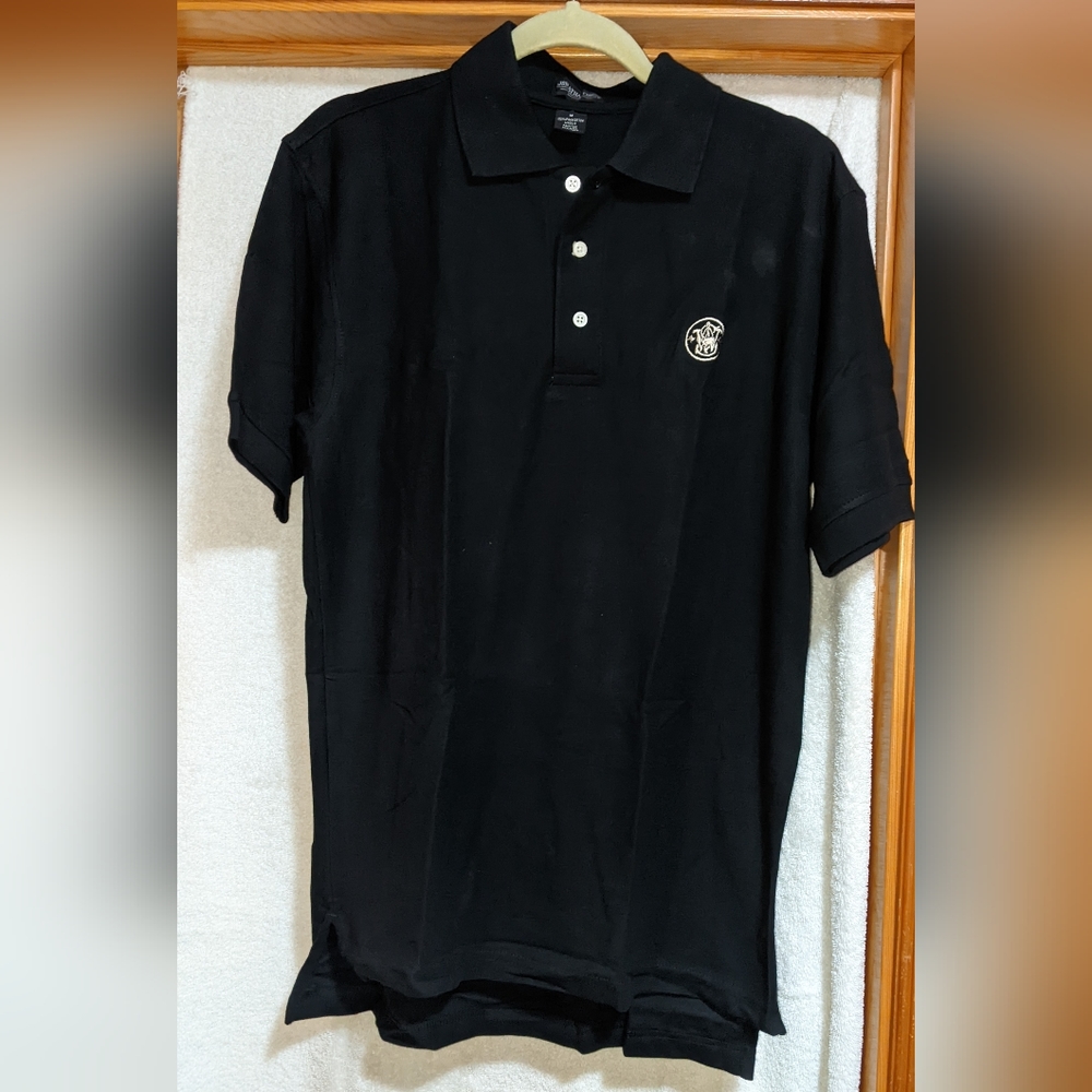 New navy Smith & Wesson polo shirt.  Short sleeve and has S&W logo.